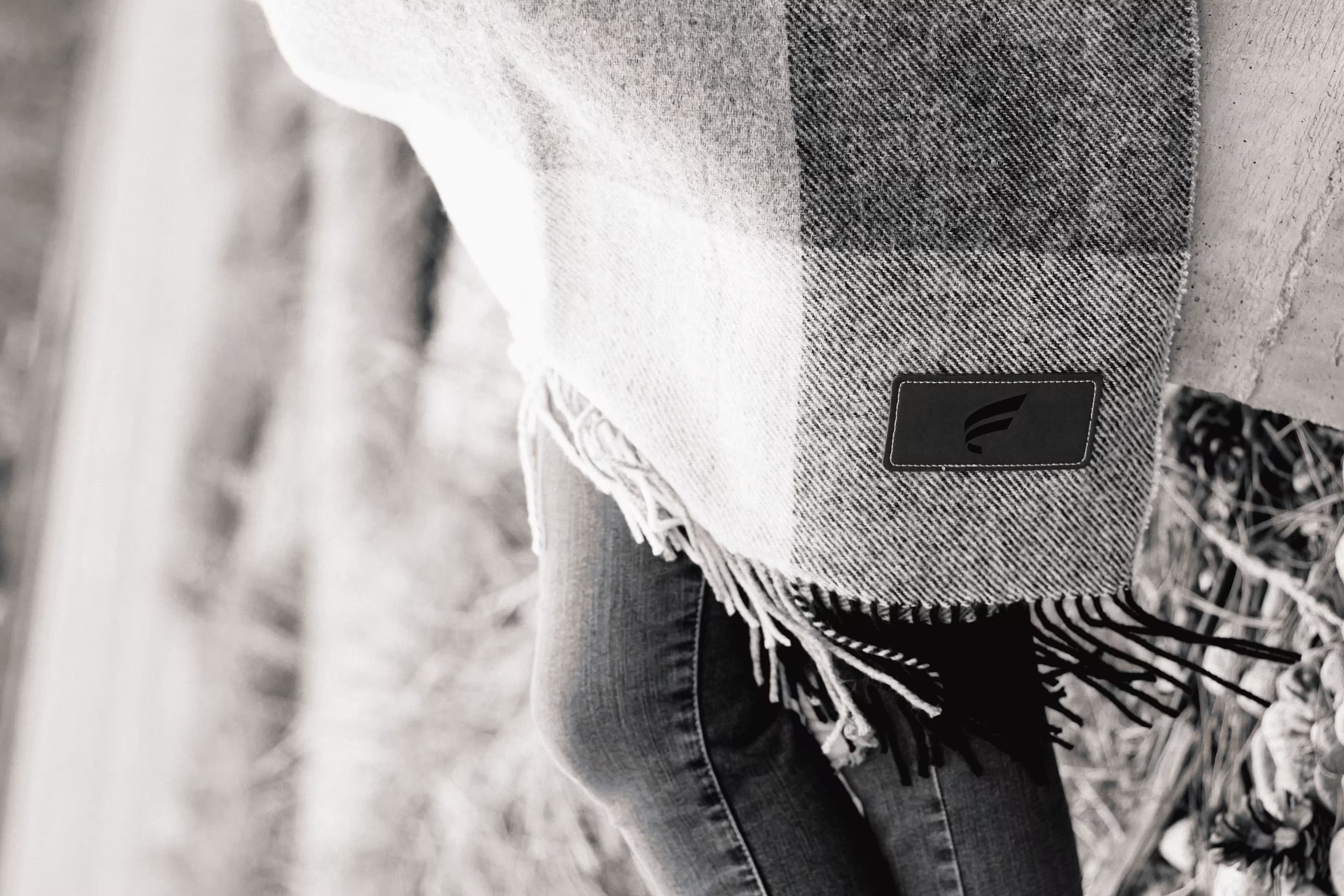 Grey scarf with leather Fluent logo patch